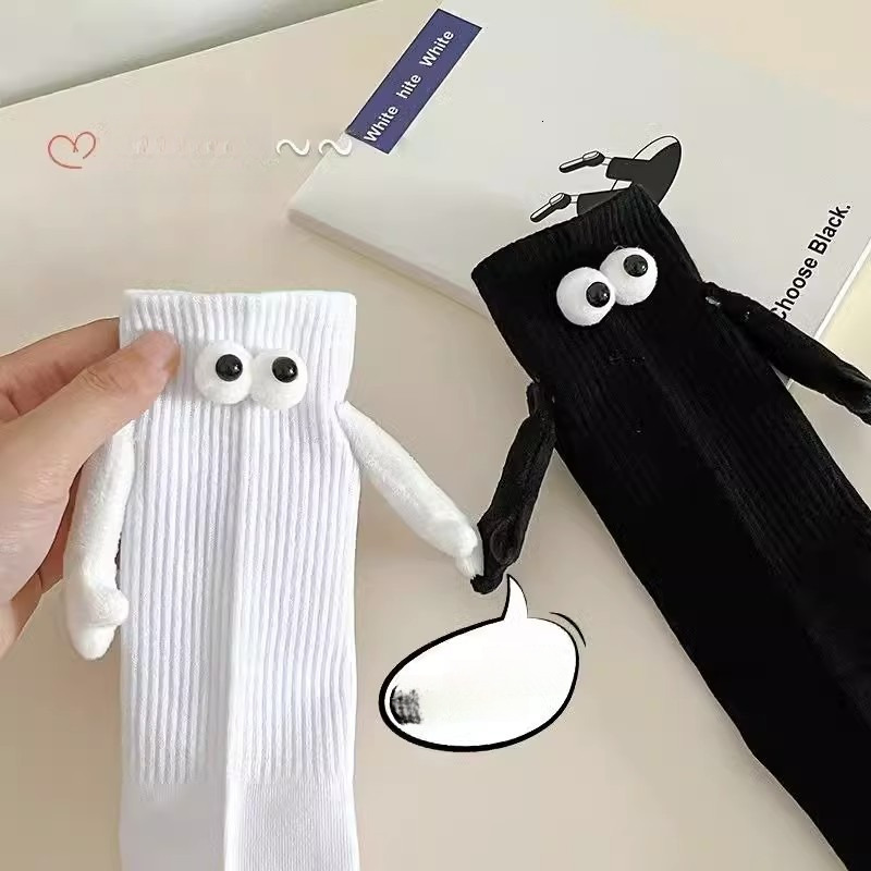 Couple holding hands Tiktok net red magnetic suction stereo eye tube socks cotton personality funny black and white stockings