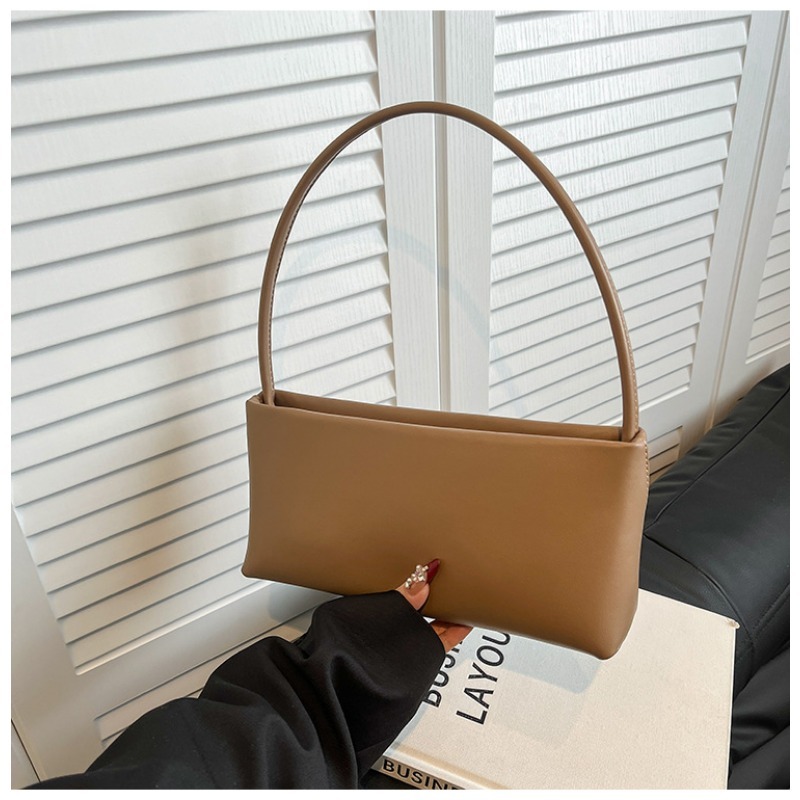 Trendsetting Diagonal Carryall Tote by Contemporary Designer Compact Yet Spacious Arm Pit Sling