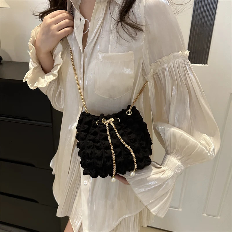 Home>Product Center>Brushed Chain Backpack>High Quality Womens Bag>Solid Folded Cross Body Bag 250427