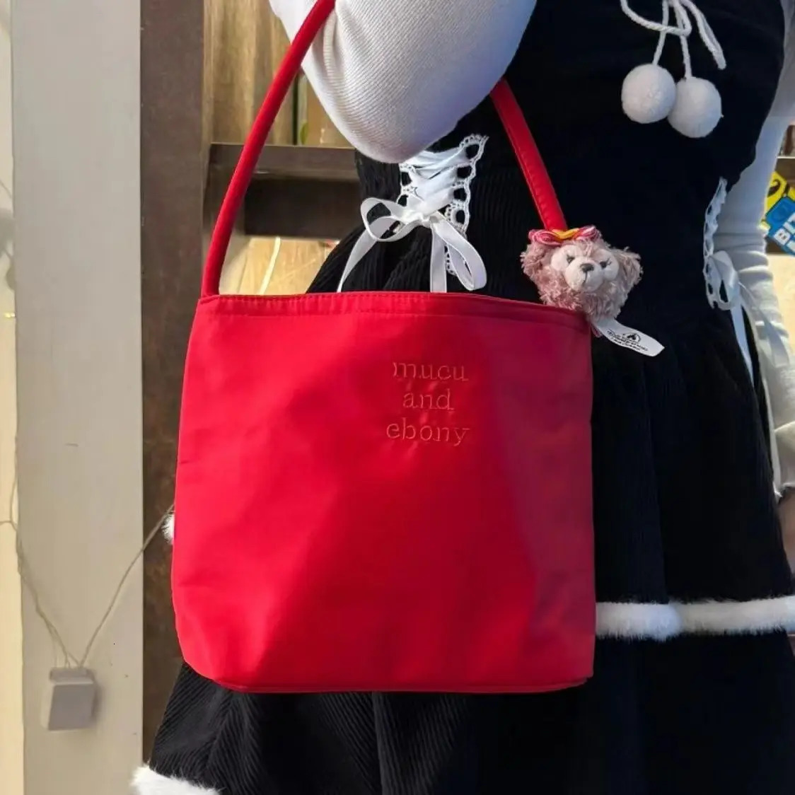 Korean papaya and ebony fashionable embroidery high elasticity waterproof nylon versatile casual womens shoulder bag 250427