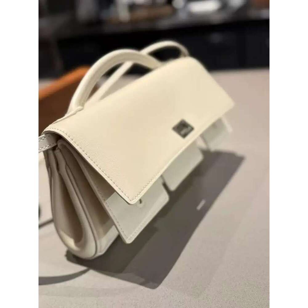 Genuine leather handbag 2025 new niche design lock small square vintage motorcycle style cowhide one-shoulder crossbody bag