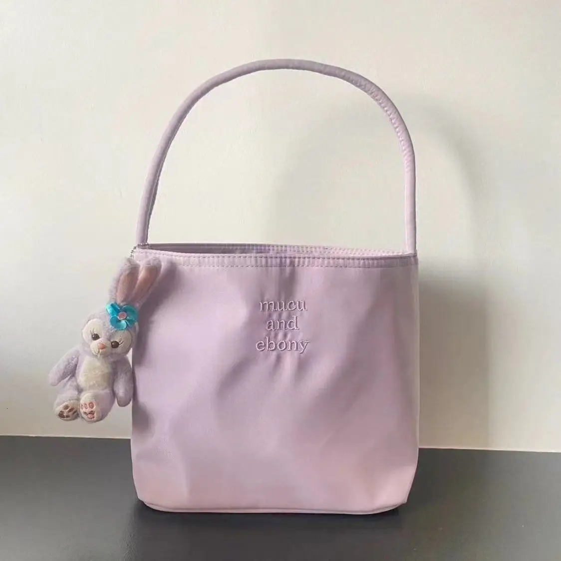 Korean papaya and ebony fashionable embroidery high elasticity waterproof nylon versatile casual womens shoulder bag 250427