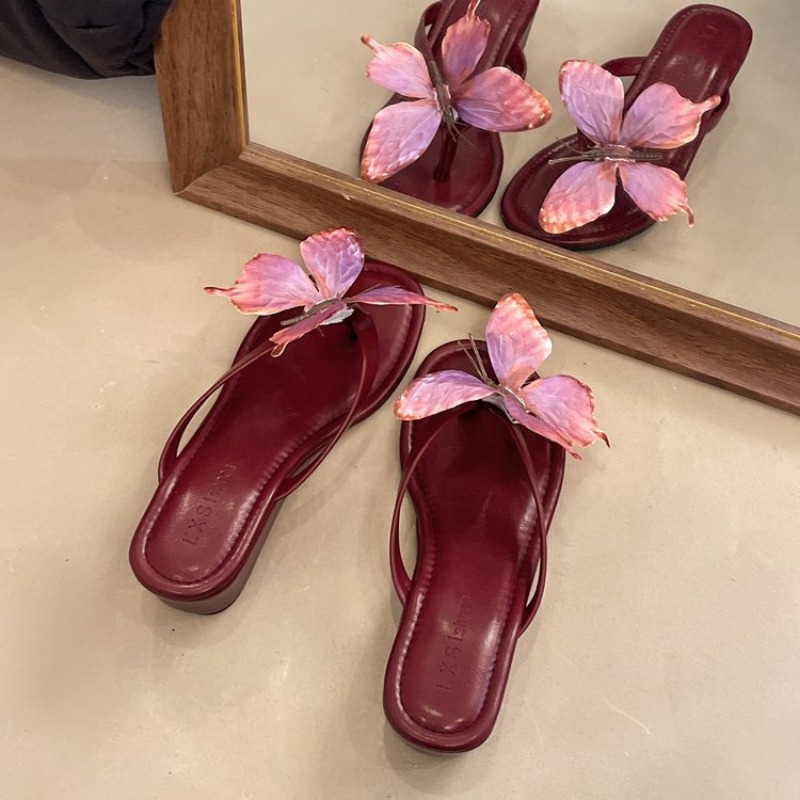 Summer New Three-dimensional Bow Flat Bottom Slope Heel Flip-flops Women's Fashion Beach Vacation Sandals