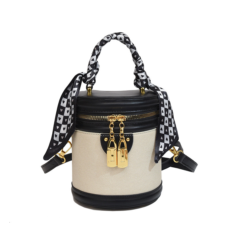 Designer's Multifunctional Small Female Trend Spring New Fashion Niche Crossbody Bag Texture Diamond Grid Handheld Bucket Bag
