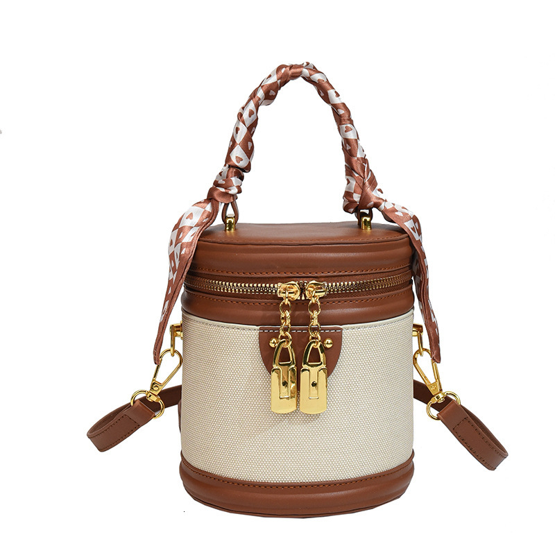 Designer's Multifunctional Small Female Trend Spring New Fashion Niche Crossbody Bag Texture Diamond Grid Handheld Bucket Bag