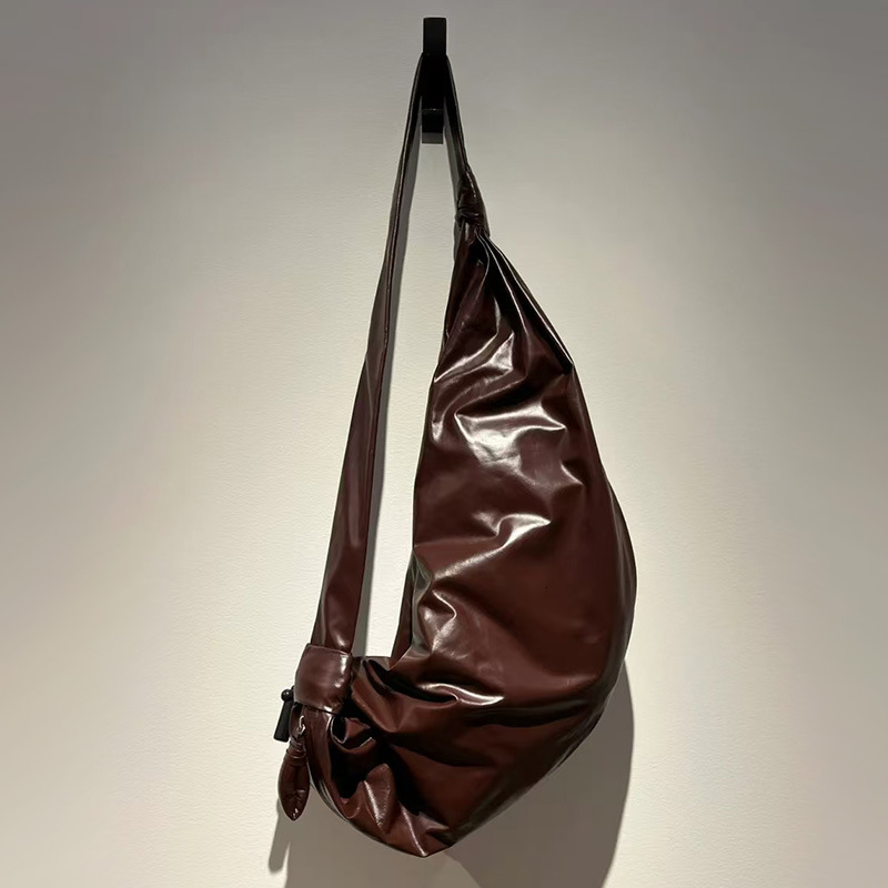 2024 new paper leather horn niche design oil wax cowhide dumpling versatile commuting neutral style can be sung bun