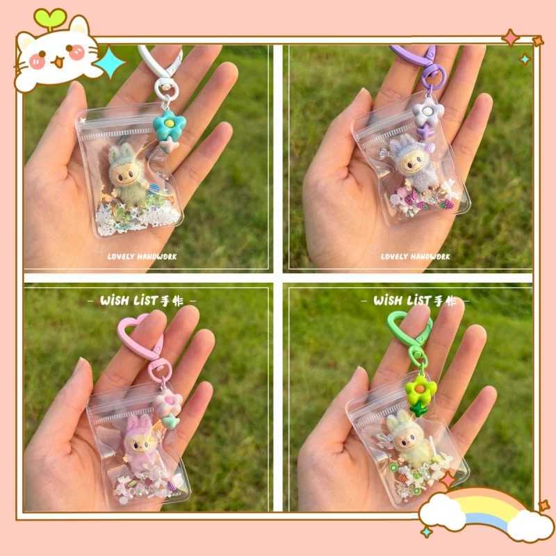 New Erchuang plush mini Labubu crushed stone vinyl cute particles baby walking bag mobile pendant cute keychain gift M250419