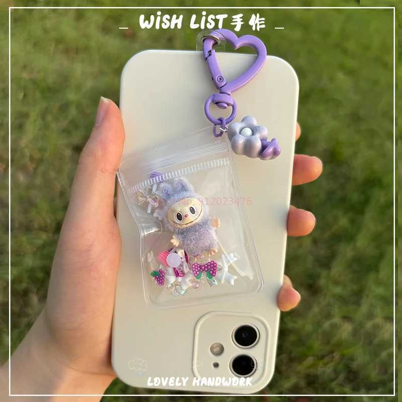 New Erchuang plush mini Labubu crushed stone vinyl cute particles baby walking bag mobile pendant cute keychain gift M250419