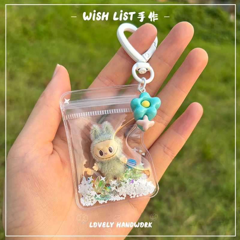New Erchuang plush mini Labubu crushed stone vinyl cute particles baby walking bag mobile pendant cute keychain gift M250419