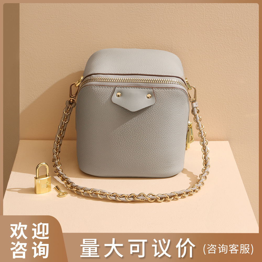 Bag Top Layer Cowhide Niche Design, Elephant Buckle Box Bag, High-End Fashion, Versatile Single Shoulder Crossbody Bag