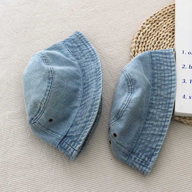 Summer childrens bucket hat boys and girls outdoor childrens sunscreen hat solid color fishing denim cloth hat baby basin beach hat M250121
