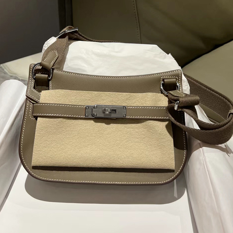 2025 Korean version new top layer cowhide gypsy niversal women's bag, single shoulder crossbody fashionable men's bag