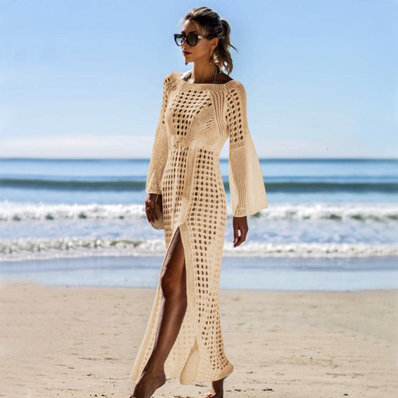 2025 New Women's Clothing Designer White Checkered Long Sleeved Knitted Hollow Beach Skirt Transparent Back Sexy Slit Flared Skirt