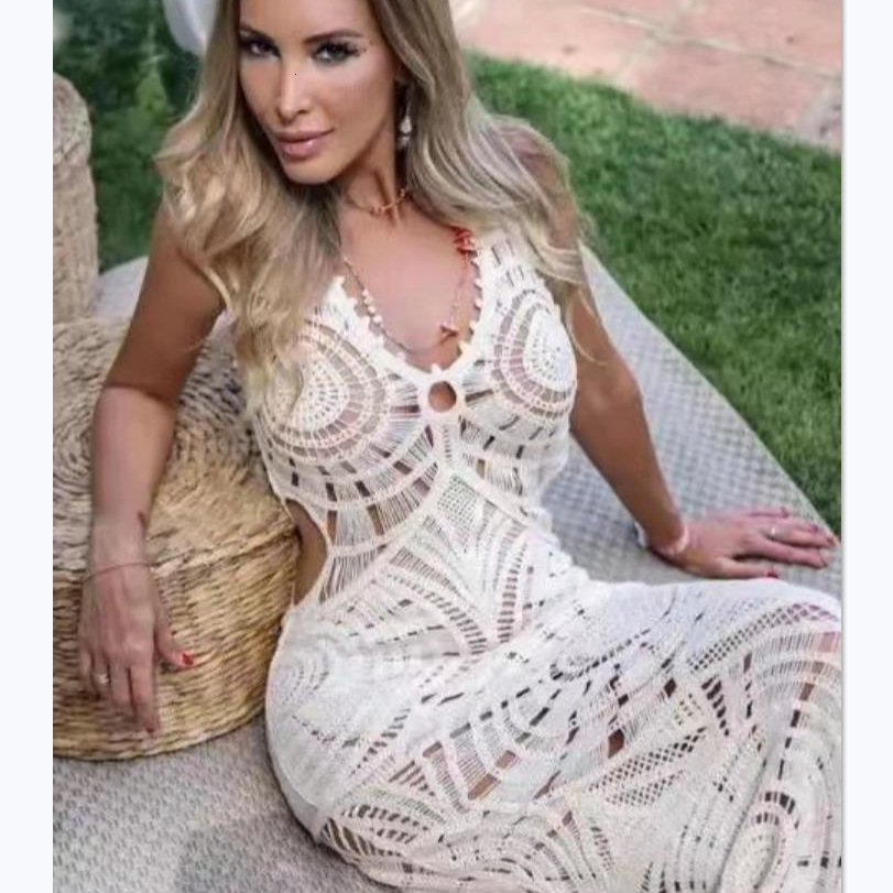 2025 New Women's Wear Designer Beach Skirt Knitted Hollow Sexy V-neck Low Cut Mid Length Skirt Female INS