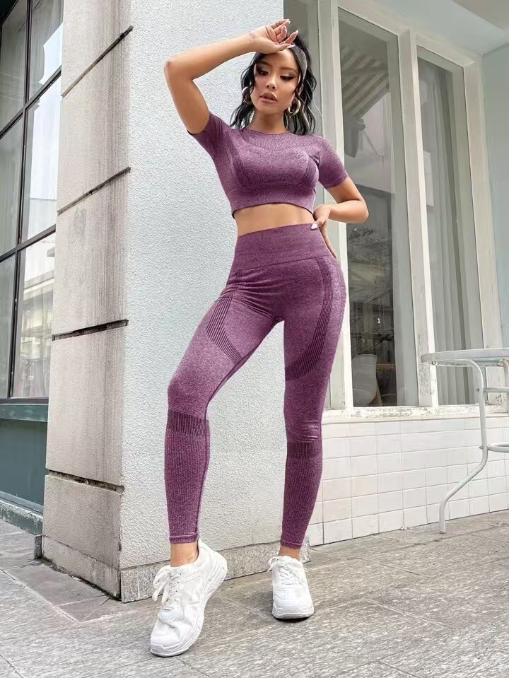 Designer European and American women's high-end versatile yoga suit short sleeved peach hip pants fitness suit casual sports suit