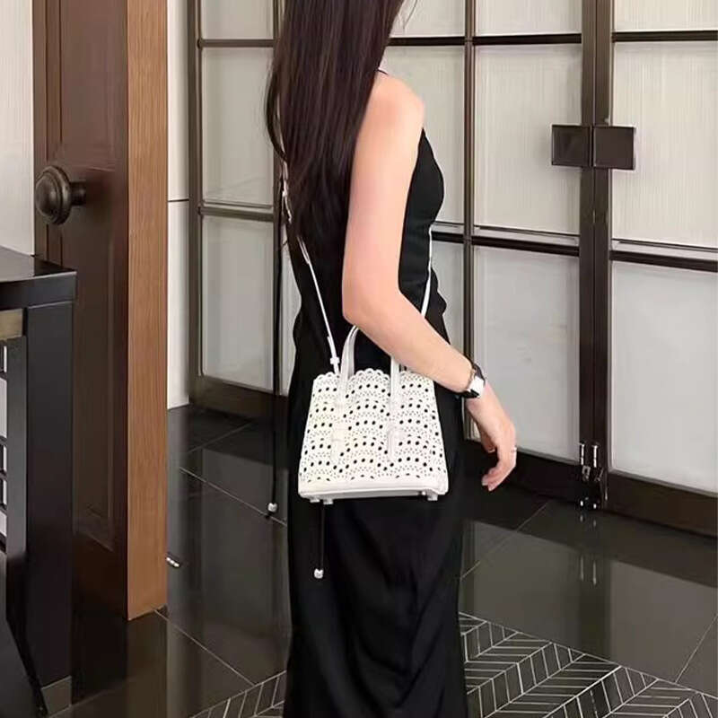New High-End Niche Wave Hollowed Out Carved Kraft Vegetable Basket Genuine Leather Women's Single Shoulder Crossbody Small Tote Bag