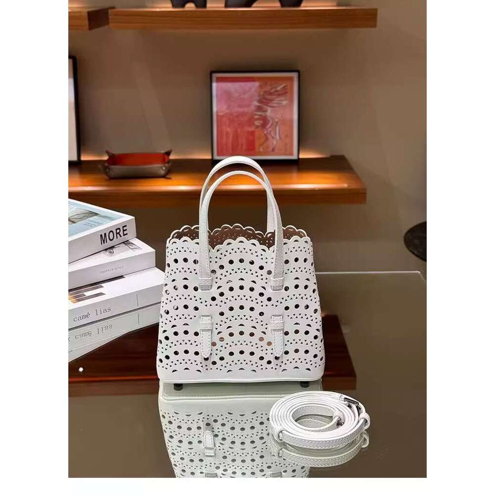 New High-End Niche Wave Hollowed Out Carved Kraft Vegetable Basket Genuine Leather Women's Single Shoulder Crossbody Small Tote Bag
