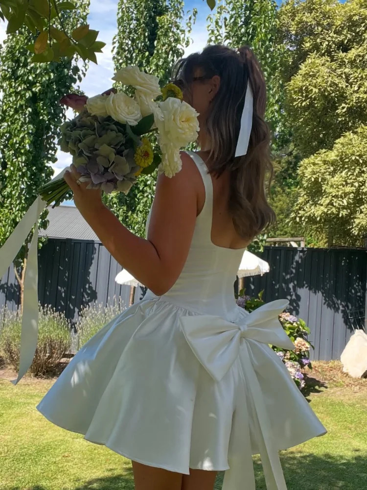 Elegant Female White Sleeveless Sling Mini Skirt Sexy Slim Pleated Chic Bow Backless Short Dress 2025 Women Evening Robes 250206