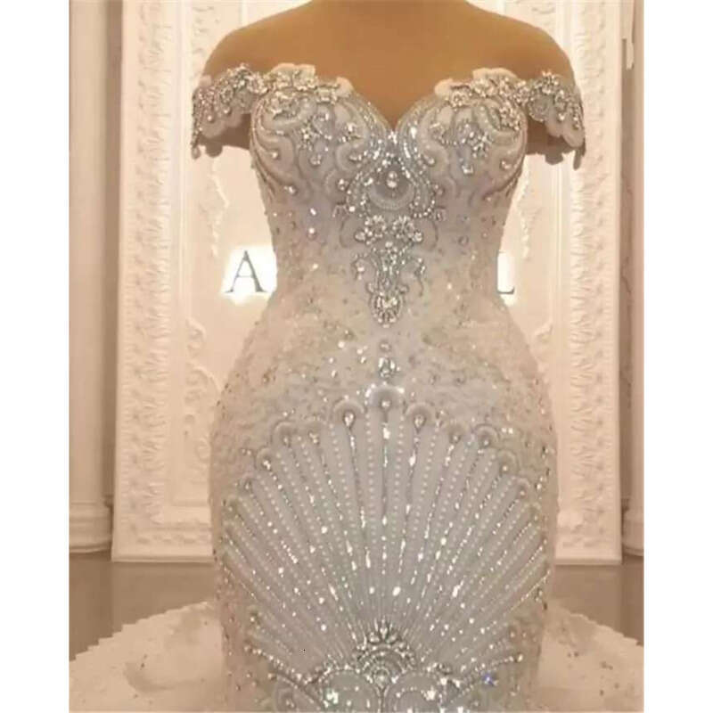 Beading Gorgeous Mermaid Wedding Dresses Bridal Gowns Lace Appliqued Off The Shoulder Tiered Sweep Train Arabic Robe De Marie Bes