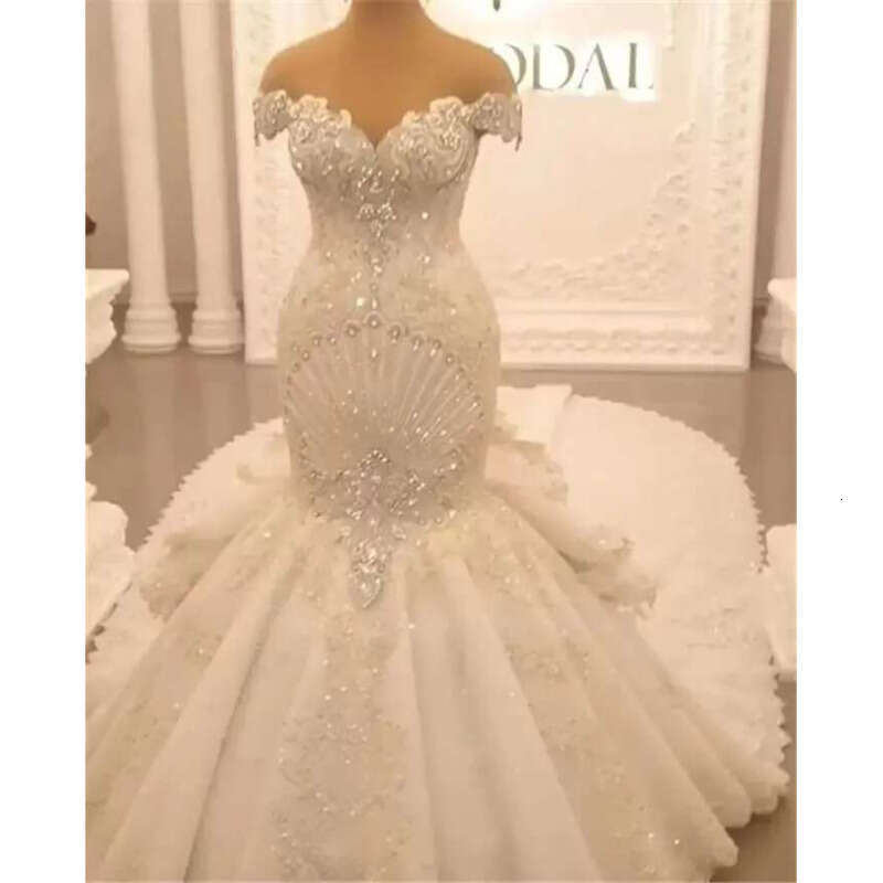 Beading Gorgeous Mermaid Wedding Dresses Bridal Gowns Lace Appliqued Off The Shoulder Tiered Sweep Train Arabic Robe De Marie Bes
