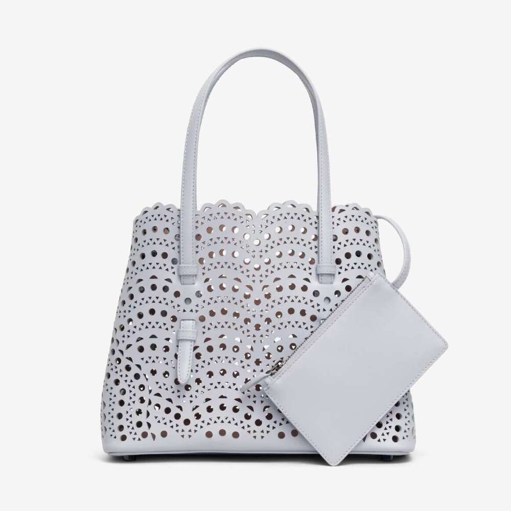 New High-End Niche Wave Hollowed Out Carved Kraft Vegetable Basket Genuine Leather Women's Single Shoulder Crossbody Small Tote Bag