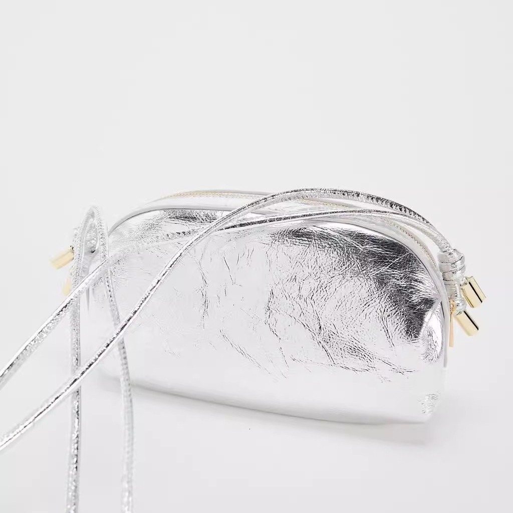 designer bag 2024 New Silver Metal Oval Single Shoulder Fashion Crossover Small Bag for Women Commuting