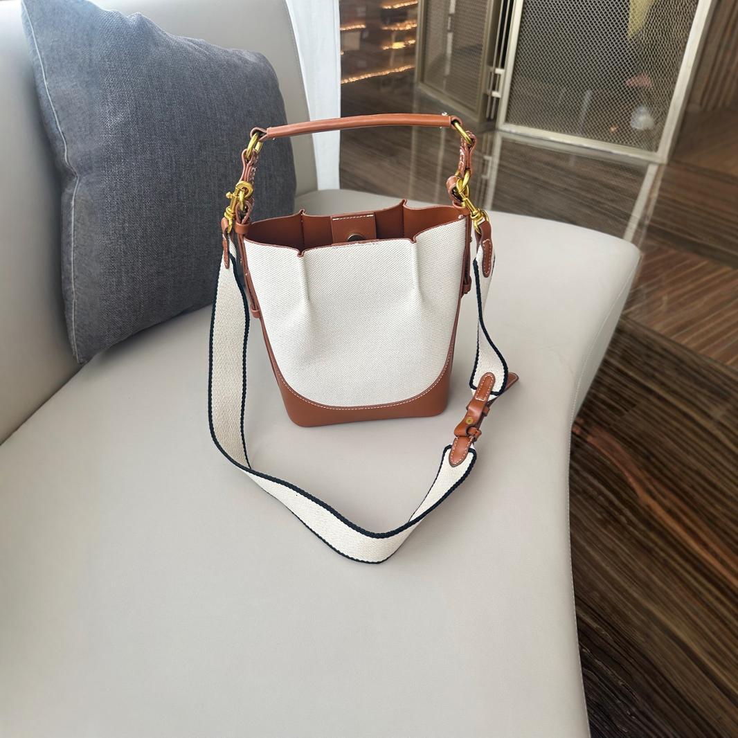 designer bag New women's with large capacity wide strap, single shoulder canvas crossbody handbag, drawstring bucket bag