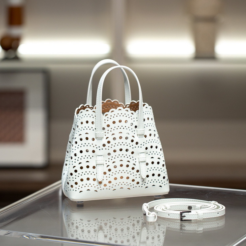 Bag 2024 New Genuine Leather Women's Wave Hollow Carving Small Basket Mini Handheld Single Shoulder Bag