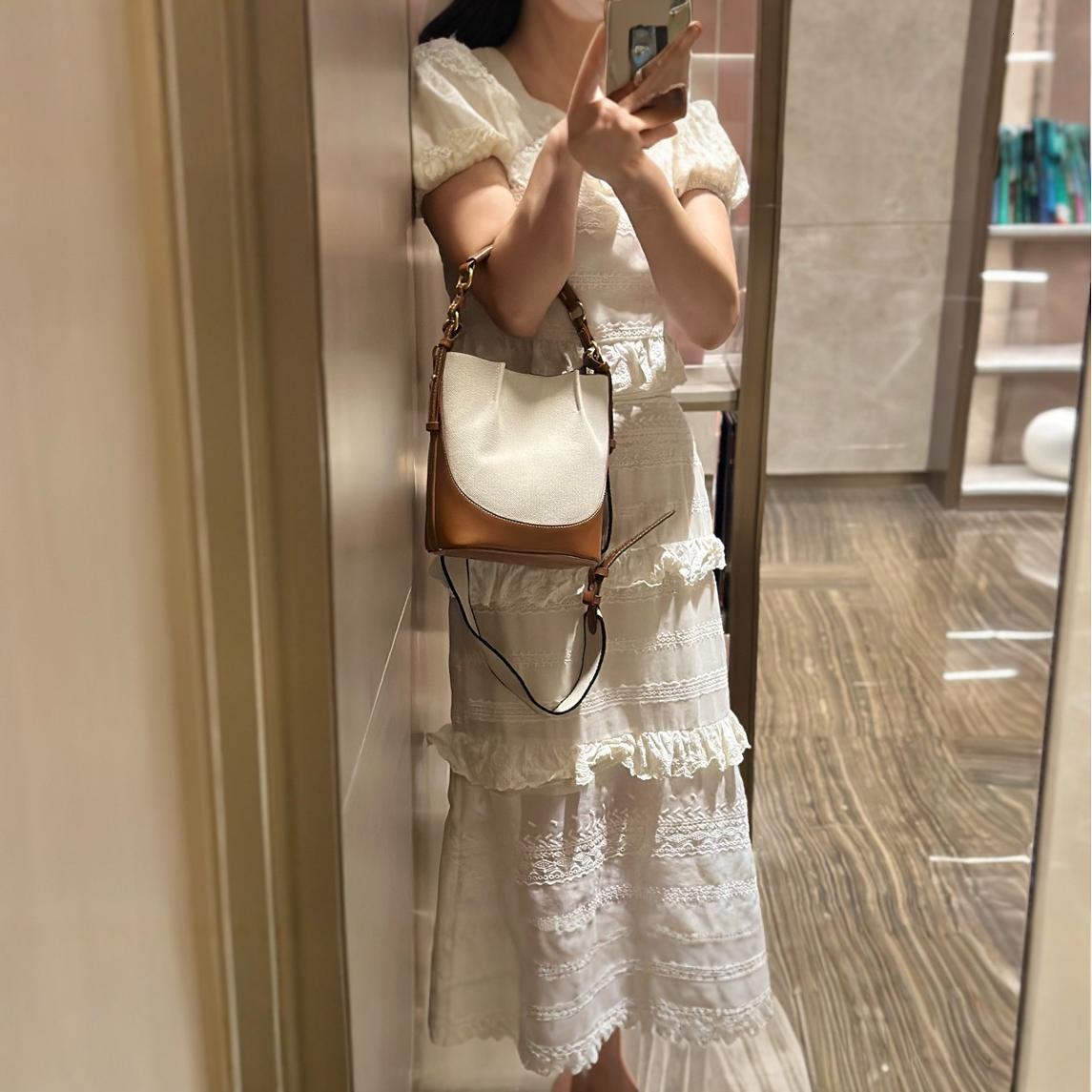 designer bag New women's with large capacity wide strap, single shoulder canvas crossbody handbag, drawstring bucket bag
