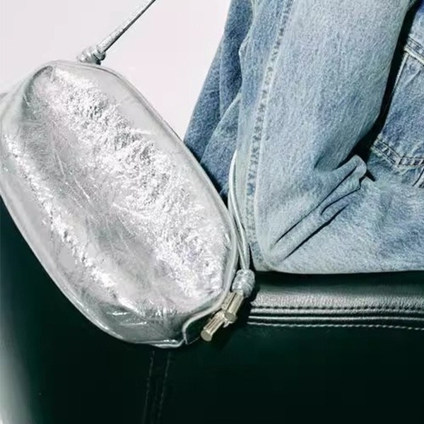 designer bag 2024 New Silver Metal Oval Single Shoulder Fashion Crossover Small Bag for Women Commuting