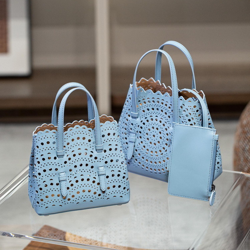 Bag 2024 New Genuine Leather Women's Wave Hollow Carving Small Basket Mini Handheld Single Shoulder Bag
