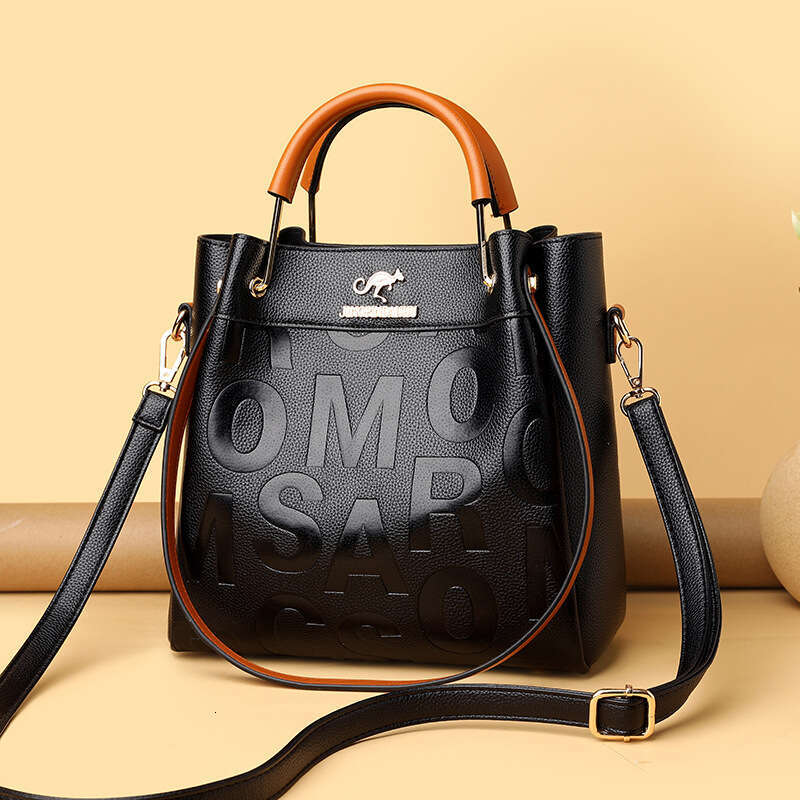 Summer for women 2025 new hollow grass woven handbag lazy style one shoulder beach vacation tote bag