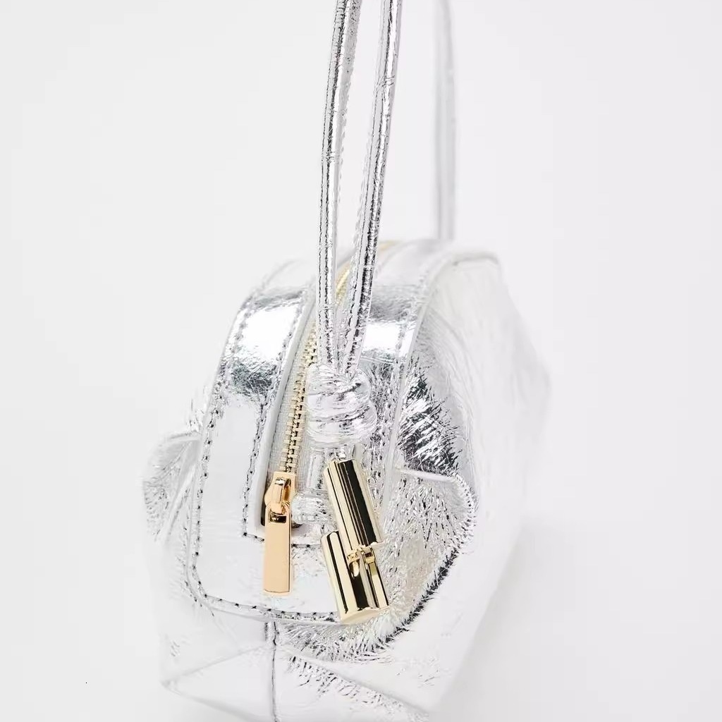 designer bag 2024 New Silver Metal Oval Single Shoulder Fashion Crossover Small Bag for Women Commuting