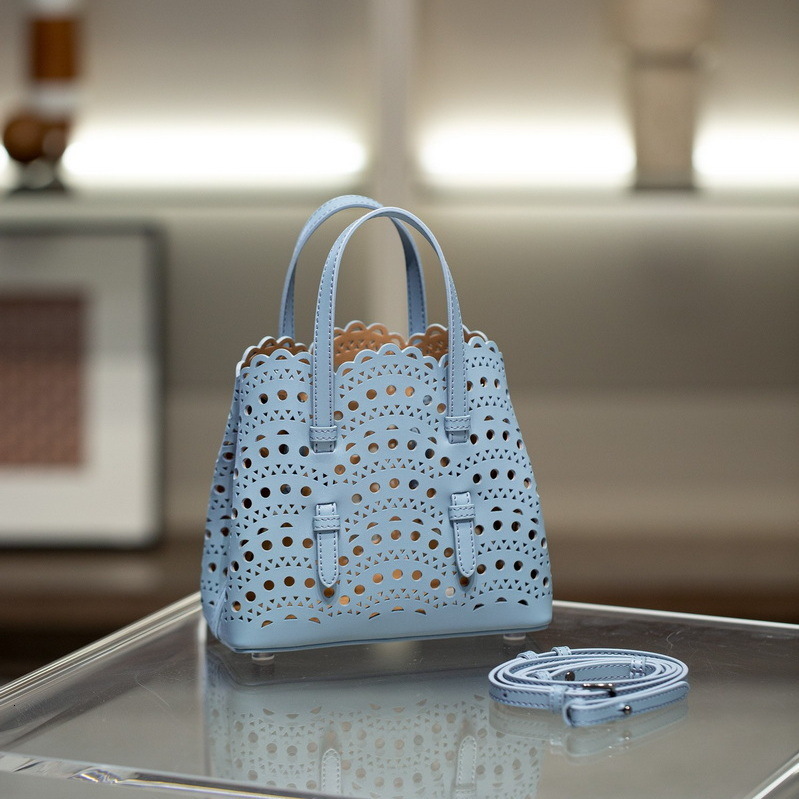 Bag 2024 New Genuine Leather Women's Wave Hollow Carving Small Basket Mini Handheld Single Shoulder Bag