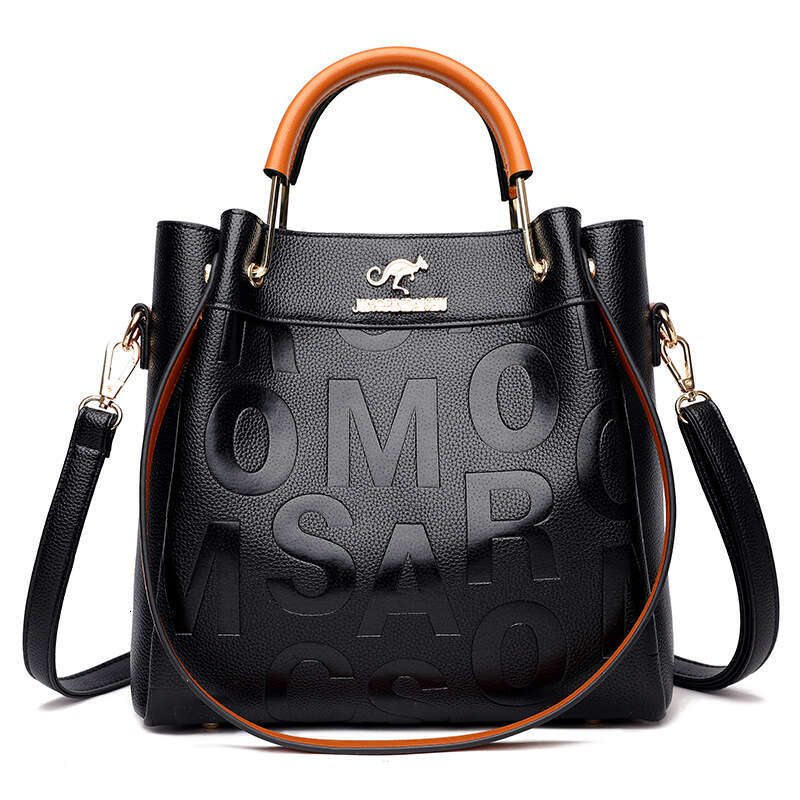 Summer for women 2025 new hollow grass woven handbag lazy style one shoulder beach vacation tote bag