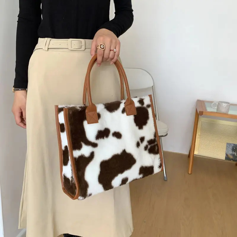 Plush cow pattern handbag Womens large capacity autumn winter fashionable plush shoulder bag college student tote bag 250207