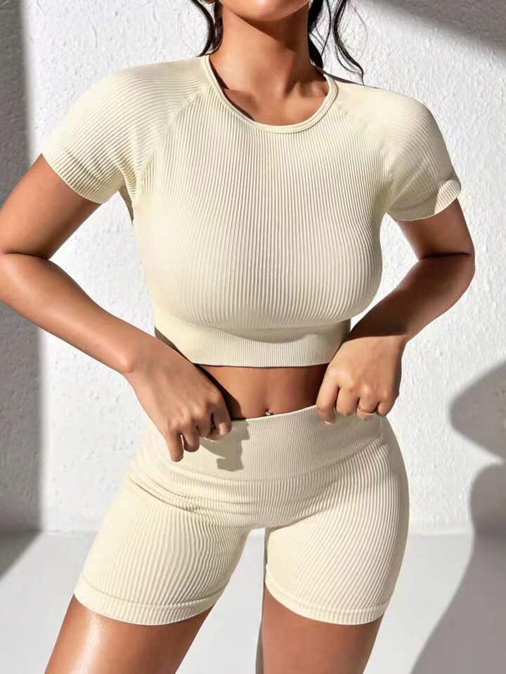 Western style women's high-end casual thread yoga suit short sleeved peach hip versatile high-quality shorts fitness suit sports set