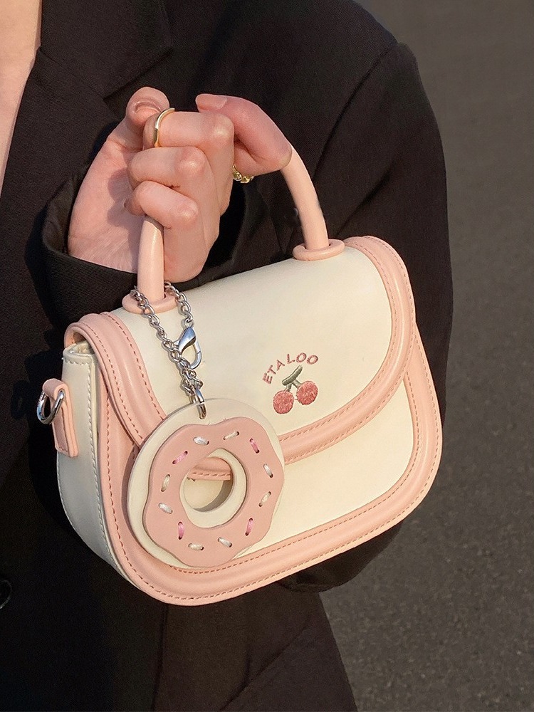 2025 new bag cute junior high school saddle bag Japanese biscuits rice white bill shoulder crossbody bag female spring and summer