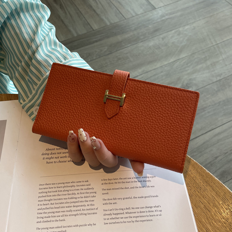 Long women's 2025 new solid color large capacity multifunctional folding high-end leather phone wallet swissmilitary