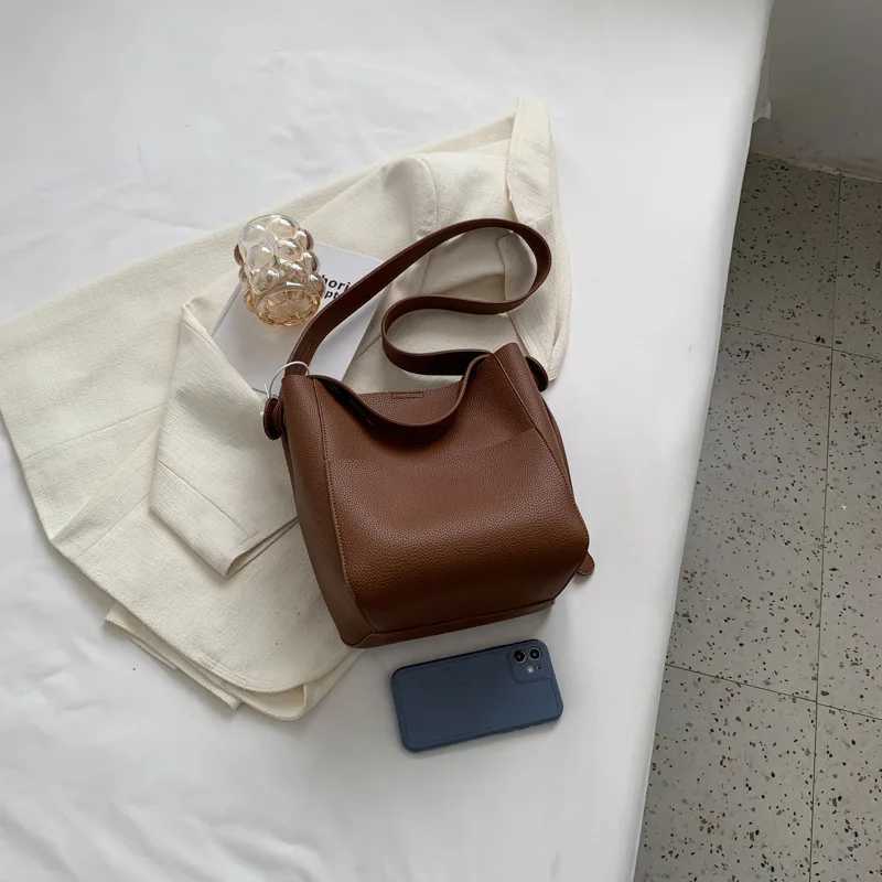 Womens bucket shoulder bag 2024 female designer trend small leather cross body bag wallet and handbagXJ250412