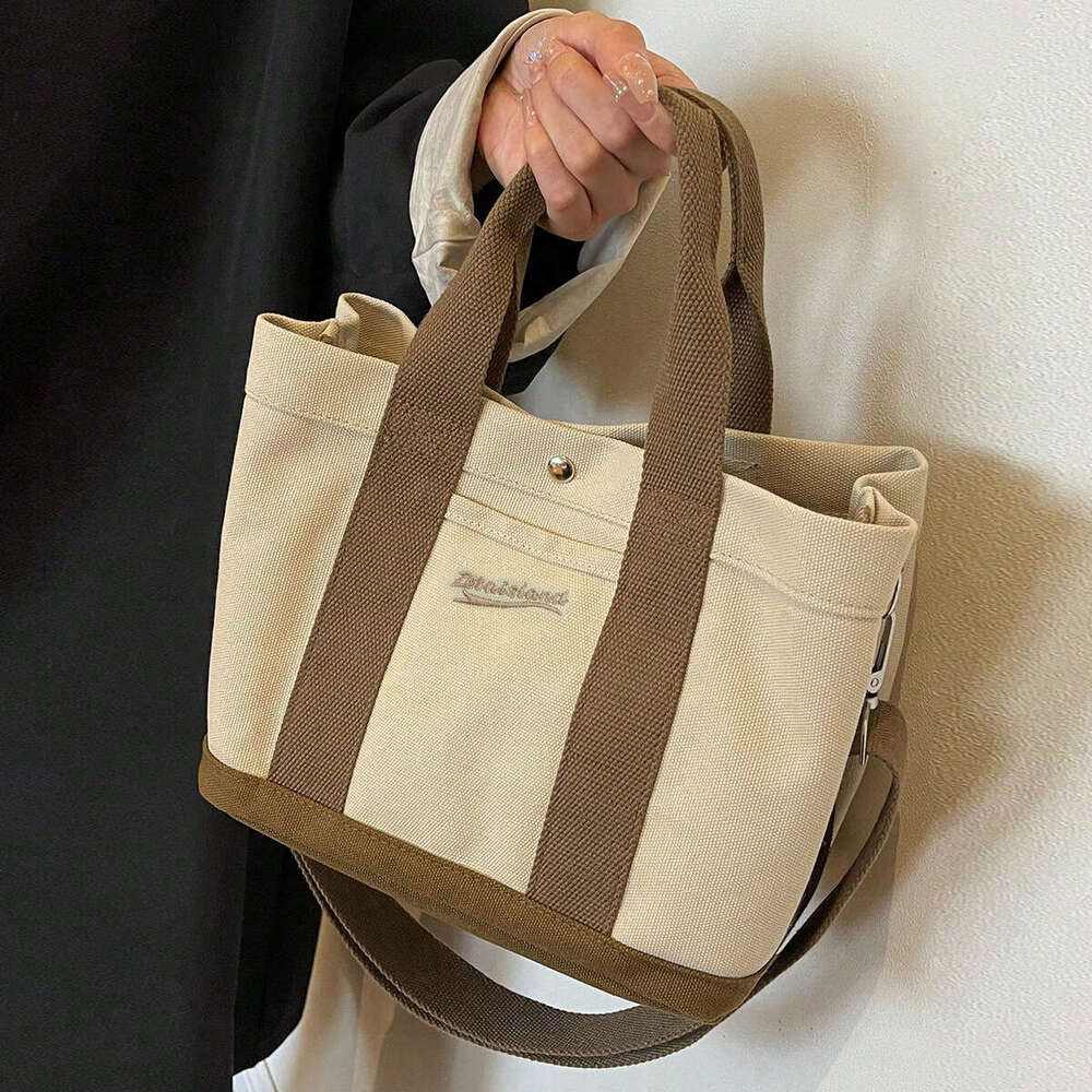 2025S Designer S New Model New Multi Layer Large Capacity Canvas Bag Women S Handheld Casual Trendy Versatile Handbag