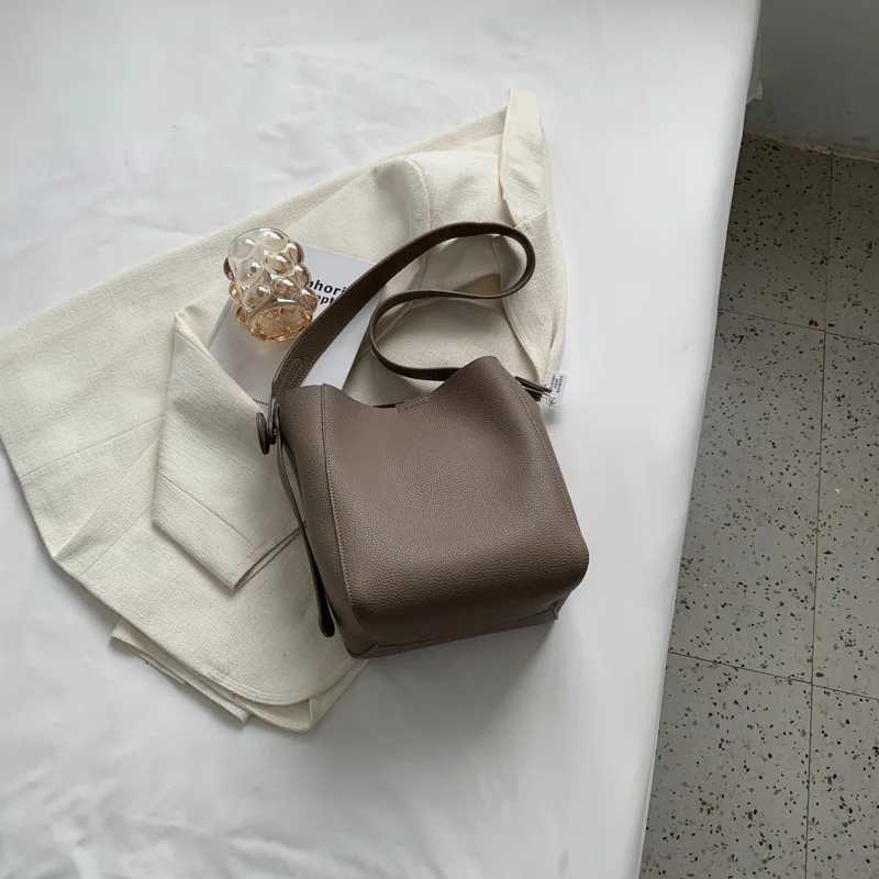 Womens bucket shoulder bag 2024 female designer trend small leather cross body bag wallet and handbagXJ250412