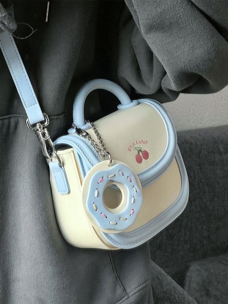 2025 new bag cute junior high school saddle bag Japanese biscuits rice white bill shoulder crossbody bag female spring and summer