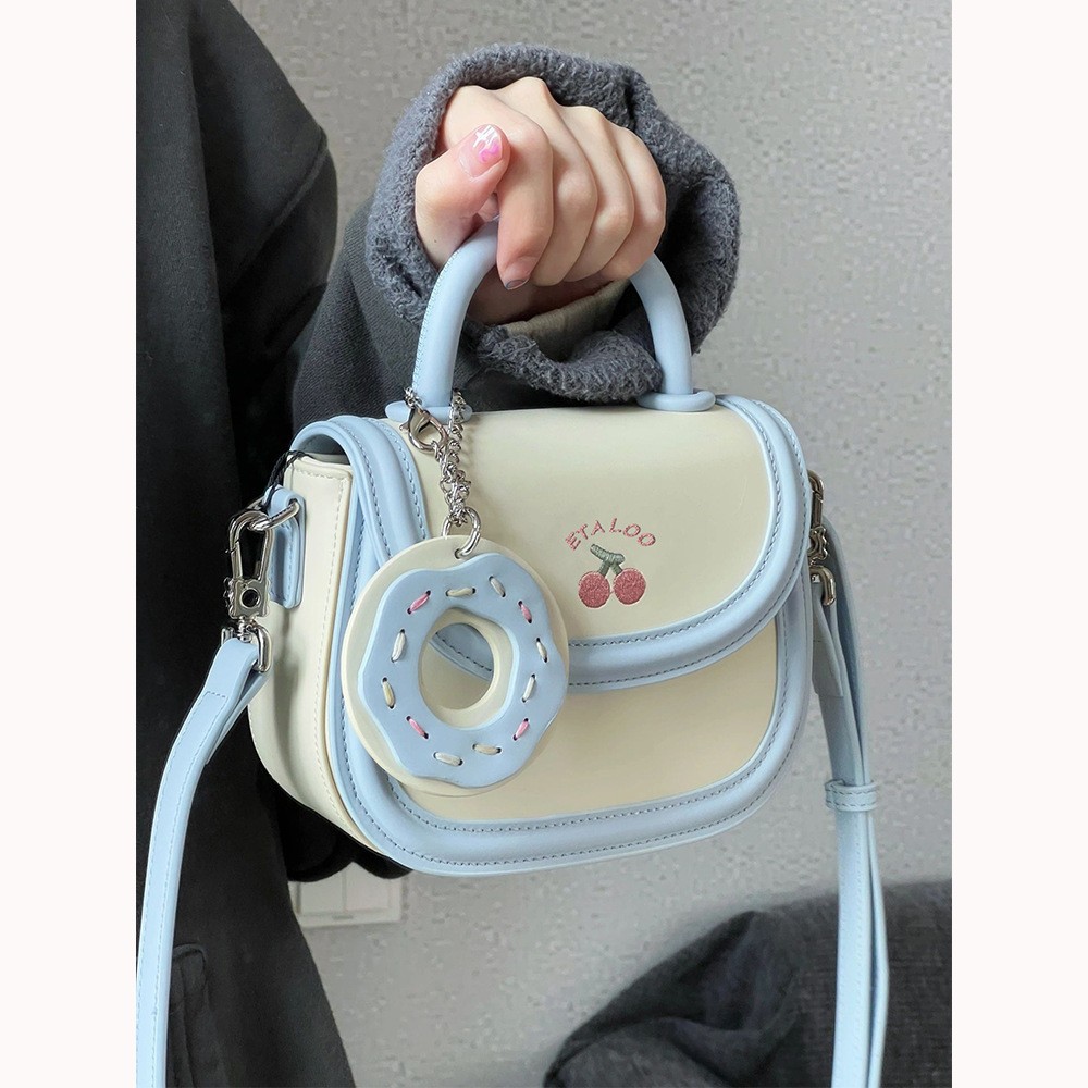 2025 new bag cute junior high school saddle bag Japanese biscuits rice white bill shoulder crossbody bag female spring and summer