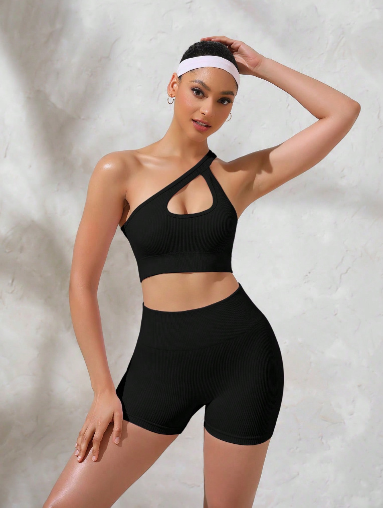 European and American women's threaded hollow sloping shoulder sexy bra seamless yoga suit peach hip shorts fitness set training sportswear