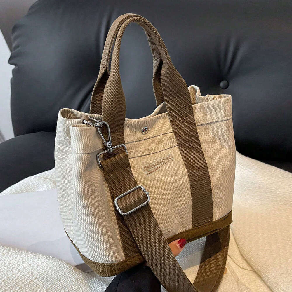2025S Designer S New Model New Multi Layer Large Capacity Canvas Bag Women S Handheld Casual Trendy Versatile Handbag