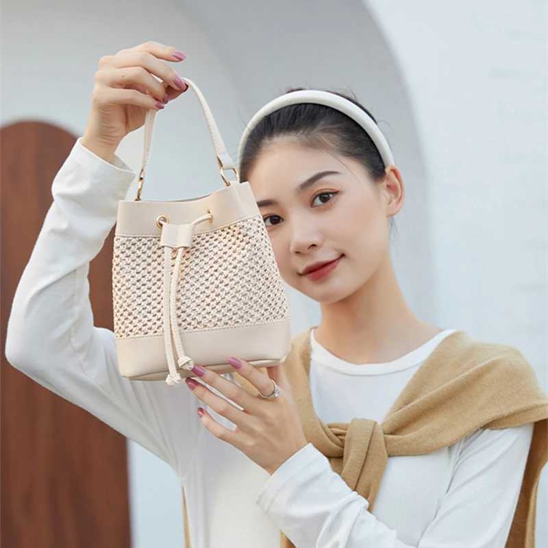Large bucket bag womens handbag mesh Drstring portable beach handbag round leather handbag Sac A Mains womens handbagXJ250412