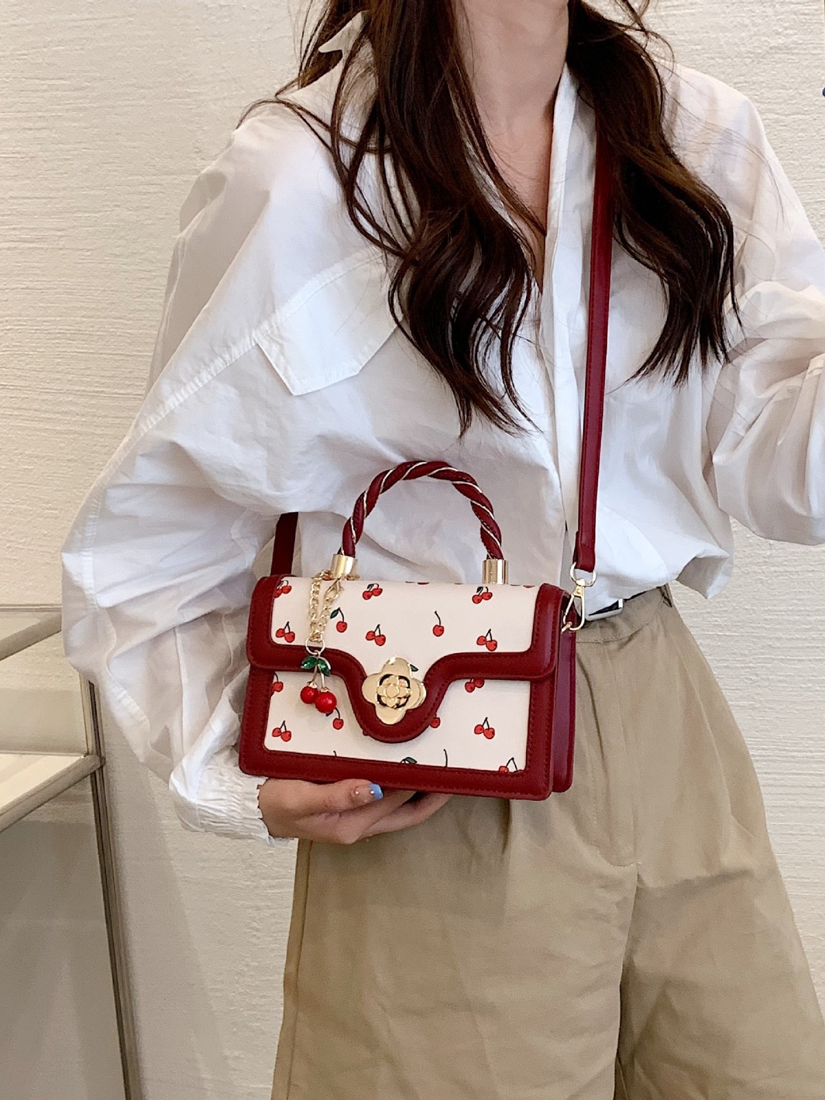 Foreign trade 2025 new lovely cherry print crossbody bag twist hand-held small square bag color contrast design small bag woman