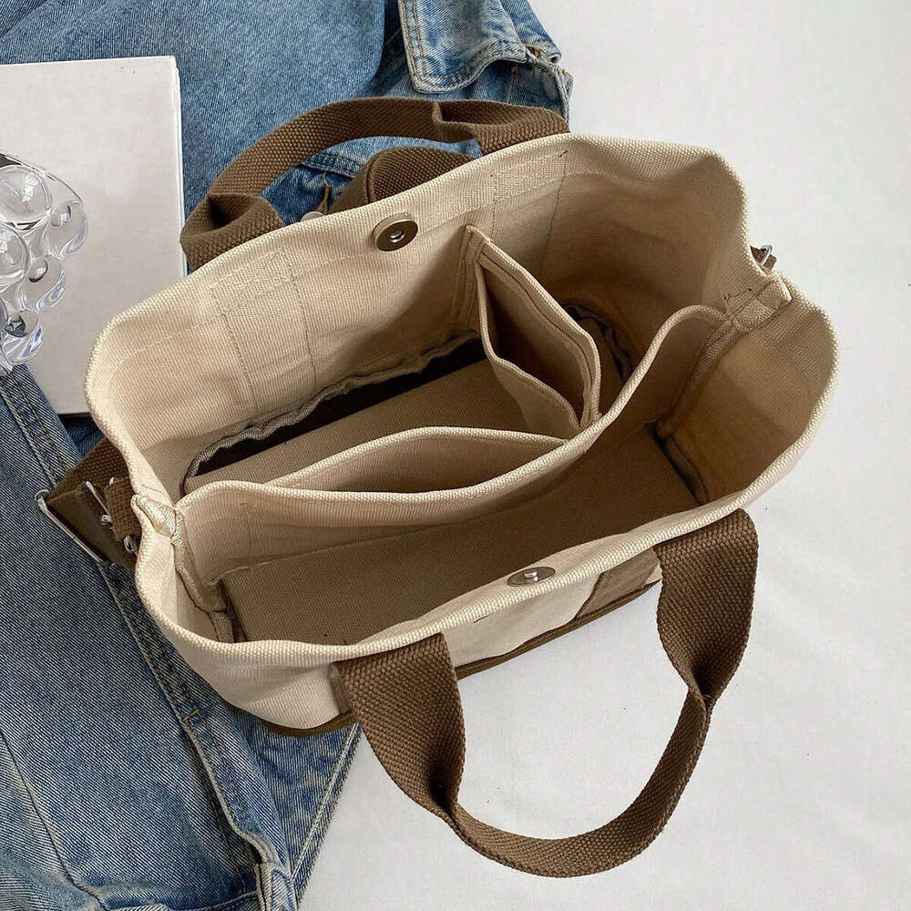 2025S Designer S New Model New Multi Layer Large Capacity Canvas Bag Women S Handheld Casual Trendy Versatile Handbag