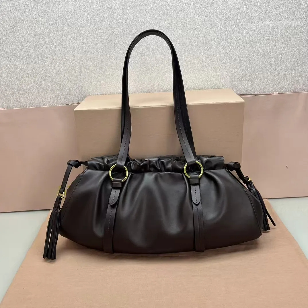 Chic Designer Women's Soft Cow Leather Large Hobo Bag - Elegant Retro Dumpling Shape with Embellished Tassels